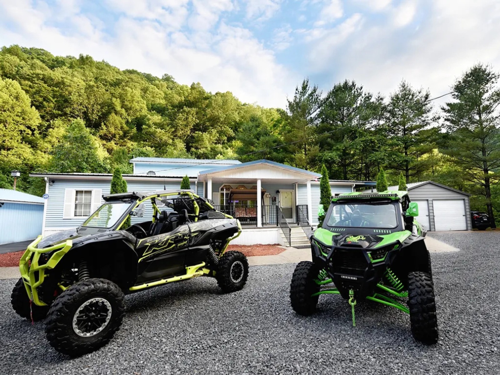 Side-by-sides and trailer parking in the driveway